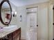 Stylish bathroom with a vessel sink, stone countertop, and antique bronze faucet for a luxurious feel at 6648 Westminster Dr, Zionsville, IN 46077