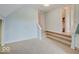 Upstairs bonus room with carpeted stairs, and neutral walls at 6648 Westminster Dr, Zionsville, IN 46077