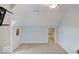 Upstairs bonus room featuring neutral paint, carpet, and ample space for activities at 6648 Westminster Dr, Zionsville, IN 46077