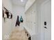 Hallway features built-in storage, hooks for coats and backpacks, and bench seating at 6648 Westminster Dr, Zionsville, IN 46077