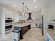 Large kitchen with stainless steel appliances, granite countertops, and a center island at 6648 Westminster Dr, Zionsville, IN 46077