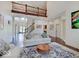 Open floor plan with high ceilings and a view of the staircase from the living room at 6648 Westminster Dr, Zionsville, IN 46077