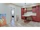 Office space with custom cabinets and a unique desk, perfect for a functional and stylish workspace at 6648 Westminster Dr, Zionsville, IN 46077