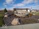 Cardinal Grove community entrance with lush landscaping and stone accents at 6712 Rawlings Ln, Indianapolis, IN 46221
