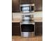 Stainless steel stove with a microwave overhead, perfect for cooking gourmet meals at 6836 Eagle Crossing Blvd, Brownsburg, IN 46112