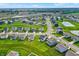 An aerial shot of a suburban neighborhood with well-maintained lawns and contemporary-style houses at 6843 Black Cherry Ter, Brownsburg, IN 46112