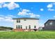 A large backyard features a two-story home and an outdoor picnic table at 6843 Black Cherry Ter, Brownsburg, IN 46112