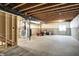 Unfinished basement showcasing exposed beams, utilities, and ample space at 6843 Black Cherry Ter, Brownsburg, IN 46112