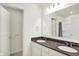 Bathroom features a double sink with granite countertop at 6843 Black Cherry Ter, Brownsburg, IN 46112