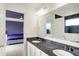 Bathroom features a double sink with granite countertop at 6843 Black Cherry Ter, Brownsburg, IN 46112