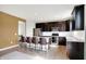 Stylish kitchen featuring an island with bar seating, stainless steel appliances, and ample counter space at 6843 Black Cherry Ter, Brownsburg, IN 46112