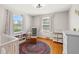 Bedroom with a window seat, a colorful rug, and stylish furniture at 7060 N Park Ave, Indianapolis, IN 46220