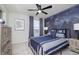 Stylish bedroom featuring an accent wall with a world map and modern furnishings at 7239 Barrett Dr, Brownsburg, IN 46112