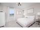 Bright bedroom with a soft, pink color scheme and natural light from the window at 7239 Barrett Dr, Brownsburg, IN 46112