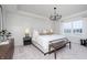 Spacious main bedroom featuring a tray ceiling, ample natural light, and a calming color palette at 7239 Barrett Dr, Brownsburg, IN 46112