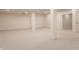 Finished basement with neutral carpet and paint and support beams and doors throughout at 7406 N Washington Blvd, Indianapolis, IN 46240