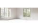 Bright bedroom with two large windows offering great natural light and view at 7406 N Washington Blvd, Indianapolis, IN 46240