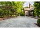 Large stone patio with brick accents, perfect for outdoor entertaining and relaxation at 7406 N Washington Blvd, Indianapolis, IN 46240