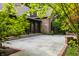 Spacious stone patio with brick accents, perfect for outdoor entertaining and relaxation at 7406 N Washington Blvd, Indianapolis, IN 46240