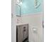 Charming powder room featuring wainscoting, modern vanity, and nautical decor for a touch of coastal elegance at 7595 Heather Dr, Nineveh, IN 46164