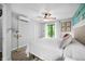 Cozy bedroom with hardwood floors, comfortable bed, and relaxing natural light creating a serene atmosphere at 7595 Heather Dr, Nineveh, IN 46164