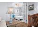 Cozy bedroom view from the living room showcases a comfortable bed and neutral decor at 7595 Heather Dr, Nineveh, IN 46164