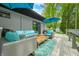 Relaxing deck featuring a cozy seating area with plush cushions, a stylish rug, and a charming coffee table at 7595 Heather Dr, Nineveh, IN 46164