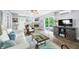 Cozy living room features a fireplace, comfortable seating, and sliding glass doors to the deck at 7595 Heather Dr, Nineveh, IN 46164
