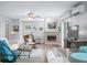 Cozy living room features a fireplace, ceiling fan and decor at 7595 Heather Dr, Nineveh, IN 46164