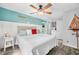 Cozy main bedroom with nautical decor, ceiling fan, and natural light at 7595 Heather Dr, Nineveh, IN 46164