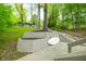 Stairway with landscaped retaining walls, leading to the house, and outdoor living space at 7595 Heather Dr, Nineveh, IN 46164