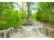 Stairway with landscaped retaining walls, leading to the house, and outdoor living space at 7595 Heather Dr, Nineveh, IN 46164