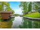 Scenic water view showcasing a tranquil cove with lush greenery along the shoreline at 7595 Heather Dr, Nineveh, IN 46164
