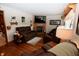 Inviting living room with a fireplace and hardwood floors at 76 Manhattan Ave, Indianapolis, IN 46241