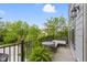 Relaxing outdoor deck with comfortable seating and a view of the surrounding greenery and neighborhood at 8245 Bostic Dr, Fishers, IN 46038
