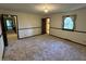 Bedroom with wood trim and baseboards plus a window for natural light at 830 Millerwood Dr, Lebanon, IN 46052