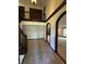 Elegant foyer with arched doorways, ceramic tile flooring, and staircase leading to the second story at 830 Millerwood Dr, Lebanon, IN 46052