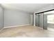 Empty bedroom with closet and neutral carpet at 8360 Paso Del Norte Ct, Indianapolis, IN 46227