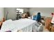 Bedroom with bed, cat tree, and storage boxes at 8360 Paso Del Norte Ct, Indianapolis, IN 46227