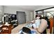 Bedroom featuring TV, recliner, and closet at 8360 Paso Del Norte Ct, Indianapolis, IN 46227