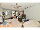 Spacious living room with ceiling fan and a neutral color scheme at 8360 Paso Del Norte Ct, Indianapolis, IN 46227