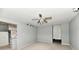 This inviting living room features plush carpeting and a ceiling fan at 8360 Paso Del Norte Ct, Indianapolis, IN 46227