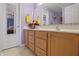Bright bathroom featuring a double vanity and a large mirror for lots of light at 8644 S Tibbs Ave, Indianapolis, IN 46217