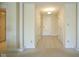Hallway with tile flooring, neutral paint, and a light fixture at 8751 Jaffa Court East Dr # Apt 32, Indianapolis, IN 46260