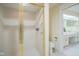 Shower with gold trim and a clear glass door at 8751 Jaffa Court East Dr # Apt 32, Indianapolis, IN 46260