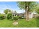 A well maintained home exterior featuring green bushes and a sunroom addition at 916 S Outer Dr, Lebanon, IN 46052