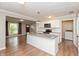 Bright kitchen featuring a granite island, stainless appliances, and white cabinetry at 916 S Outer Dr, Lebanon, IN 46052