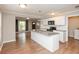 Open kitchen featuring granite counters, white cabinets and stainless steel appliances at 916 S Outer Dr, Lebanon, IN 46052