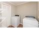 Laundry room with washer, dryer, shelving and extra storage space at 916 S Outer Dr, Lebanon, IN 46052