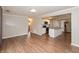 Spacious living room open to kitchen with stainless appliances and island at 916 S Outer Dr, Lebanon, IN 46052